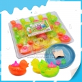 Forma de bule de chá de pato com duas xícaras de doces de brinquedo em pó 