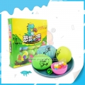 Brinquedo de ovo de dinossauro colorido com doces para pressionar para crianças 