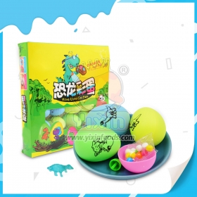 brinquedo de ovo de dinossauro com doces de prensa