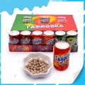 Bala doce em formato de comprimido em pote de cola 