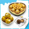 8 bolas redondas de chocolate em caixa em formato de coração 