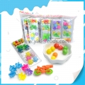 Brinquedo de plástico 3 em 1 com bala dura e doce 